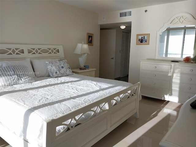 bedroom featuring visible vents