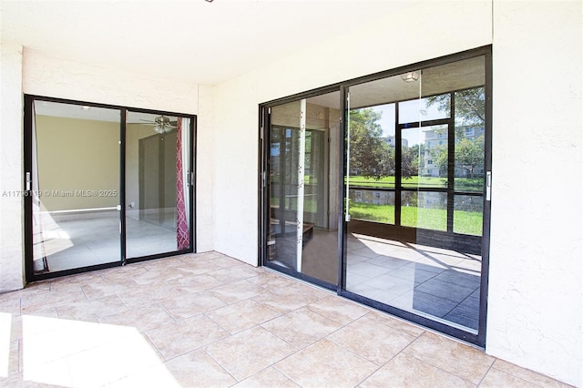 exterior space featuring a textured wall