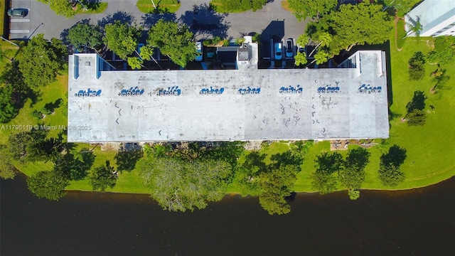drone / aerial view with a water view