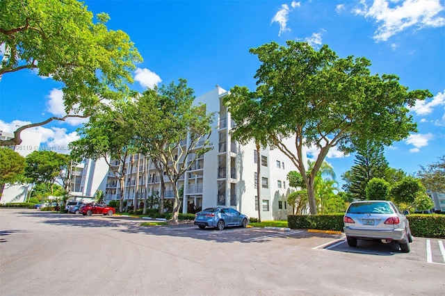 view of property with uncovered parking