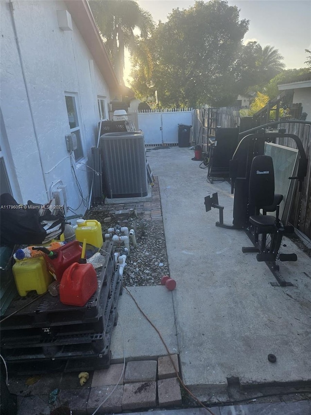 view of yard featuring central AC and a fenced backyard