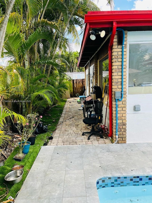 view of patio / terrace with fence