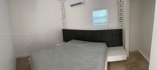 bedroom with baseboards and a wall mounted AC