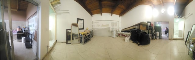 living area with tile patterned floors, lofted ceiling, and wooden ceiling