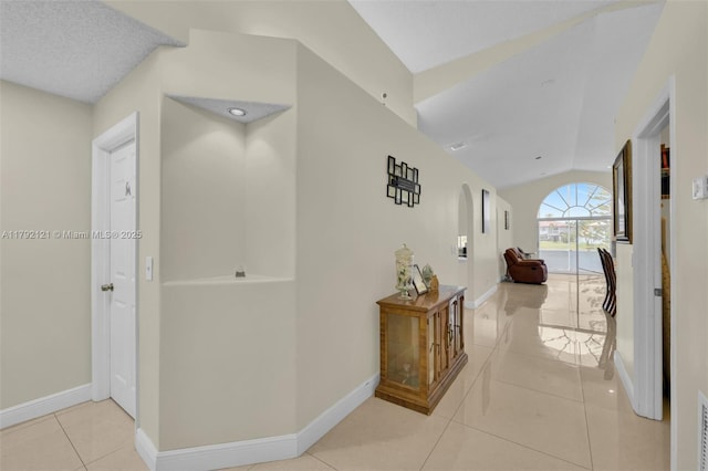 18271 SW 27th St, Miramar, FL 33029 - hall with tile patterned flooring, baseboards, and lofted ceiling