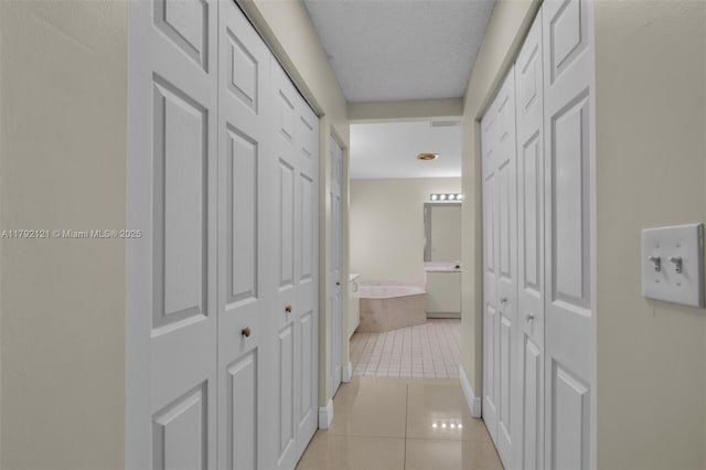 18271 SW 27th St, Miramar, FL 33029 - hallway featuring light tile patterned flooring
