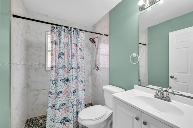18271 SW 27th St, Miramar, FL 33029 - bathroom featuring vanity, a shower stall, and toilet