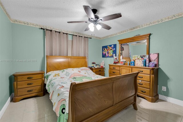 18271 SW 27th St, Miramar, FL 33029 - bedroom featuring baseboards, light tile patterned floors, a textured ceiling, and ceiling fan