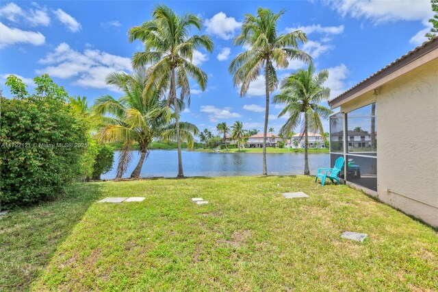 18271 SW 27th St, Miramar, FL 33029 - view of green lawn featuring a water view