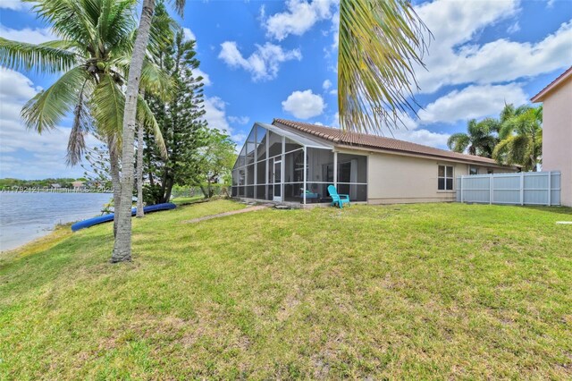 18271 SW 27th St, Miramar, FL 33029 - view of yard with a water view and a sunroom