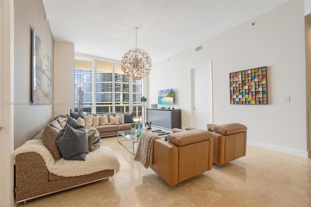 living room with visible vents, light tile patterned flooring, a wall of windows, baseboards, and a notable chandelier