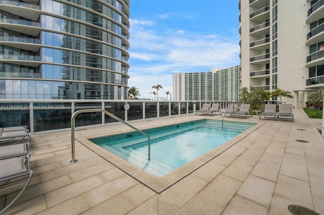 community pool featuring a patio