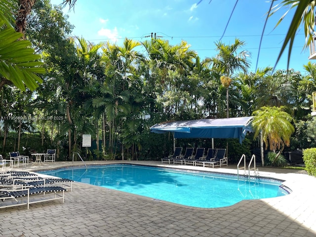 community pool featuring a patio