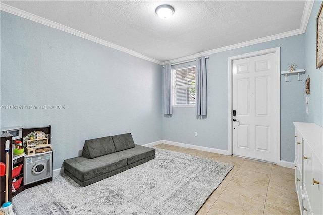 foyer featuring crown molding, light tile patterned flooring, a textured ceiling, and baseboards