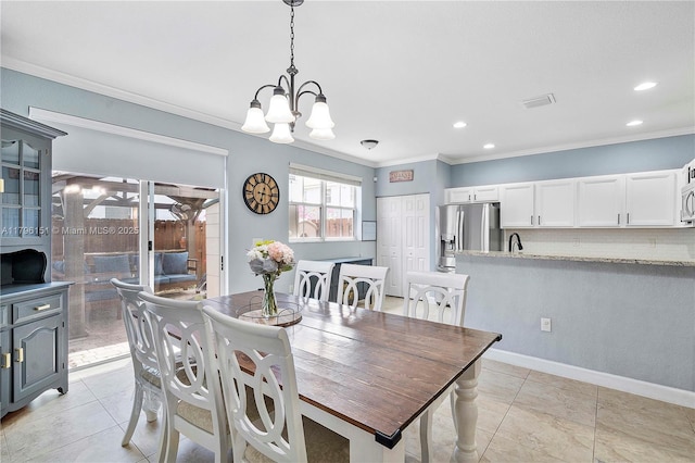 dining room featuring visible vents, an inviting chandelier, ornamental molding, recessed lighting, and light tile patterned flooring