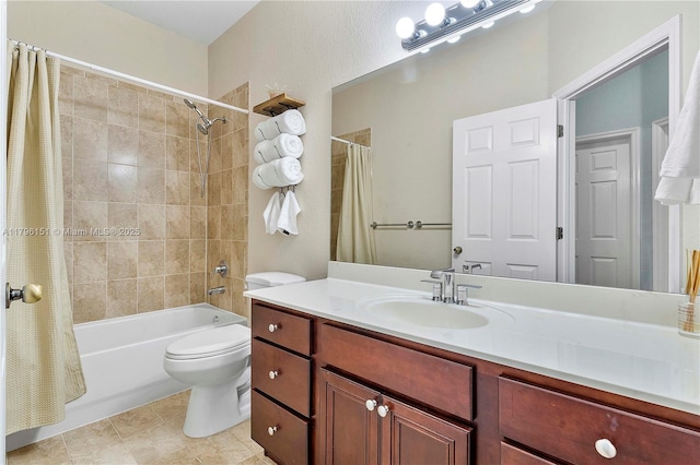 bathroom featuring toilet, tile patterned floors, shower / bath combo, and vanity