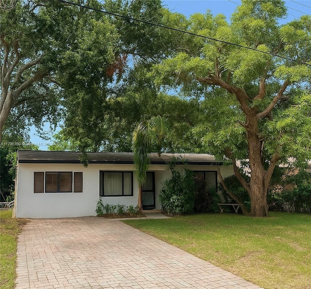 722 SW 10th St, Hallandale Beach, FL 33009 - single story home with a front lawn and stucco siding