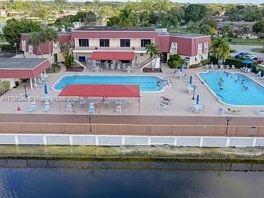 community pool with a water view