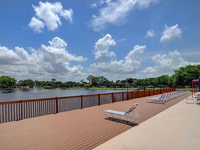 dock area featuring a water view