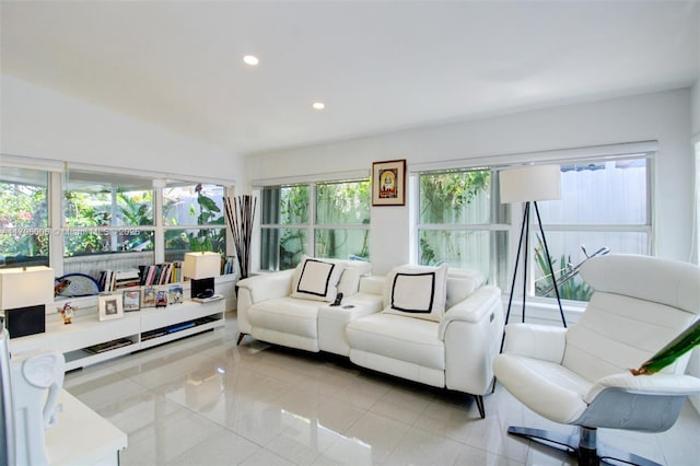 7691 NW 15th Ct, Pembroke Pines, FL 33024 - living room featuring plenty of natural light, recessed lighting, and light tile patterned floors