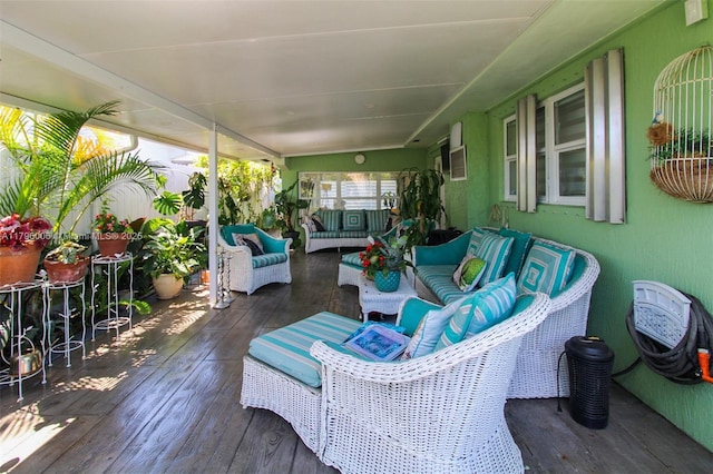 7691 NW 15th Ct, Pembroke Pines, FL 33024 - wooden terrace with an outdoor living space