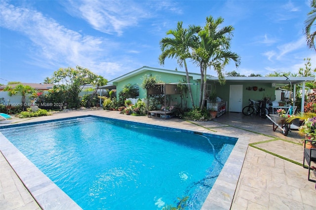 7691 NW 15th Ct, Pembroke Pines, FL 33024 - swimming pool with a patio area