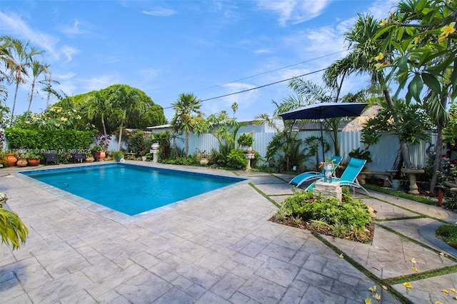 7691 NW 15th Ct, Pembroke Pines, FL 33024 - view of pool featuring a patio area and a fenced backyard