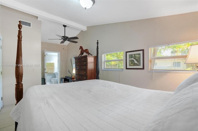 bedroom featuring visible vents, connected bathroom, and vaulted ceiling with beams