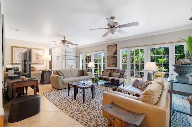 living area featuring visible vents, ceiling fan, and light tile patterned flooring