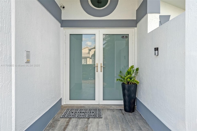 doorway to property with french doors