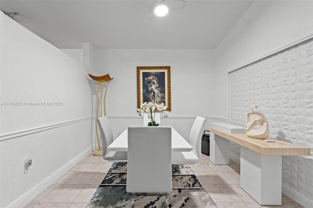 dining room featuring baseboards