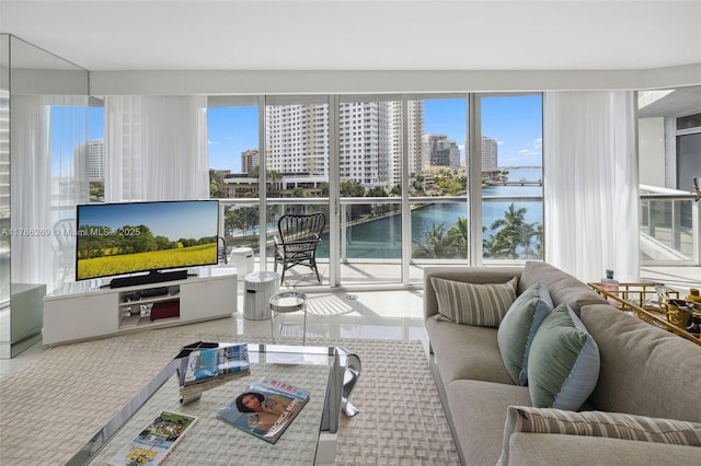 living area featuring a healthy amount of sunlight and tile patterned flooring