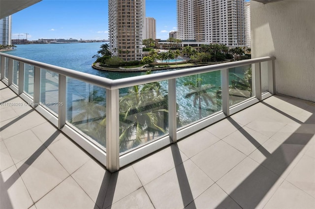 balcony with a city view and a water view