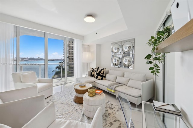 living area with a water view