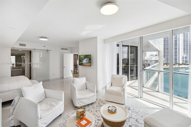 living area featuring visible vents