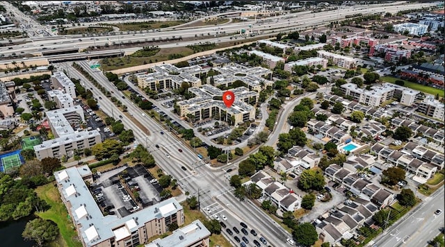 drone / aerial view featuring a city view