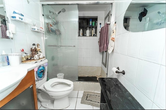 full bath with vanity, toilet, tile patterned floors, and a stall shower