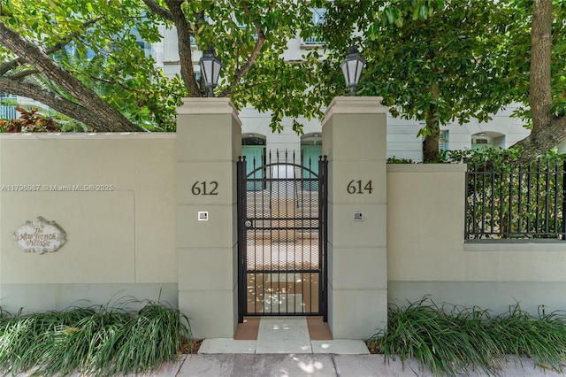 view of gate featuring fence