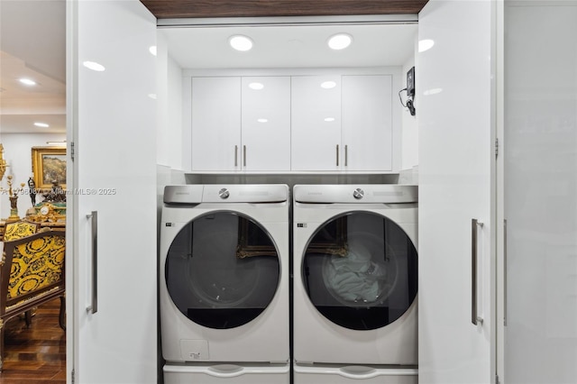 laundry room with independent washer and dryer, recessed lighting, wood finished floors, and cabinet space