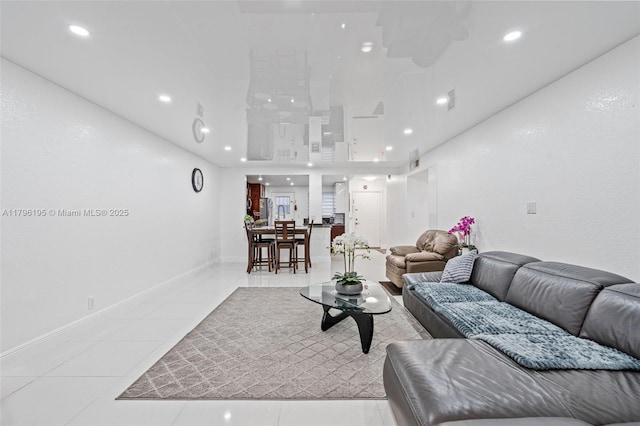 301 NE 14th Ave Unit 207, Hallandale Beach, FL 33009 - living area featuring light tile patterned floors and recessed lighting