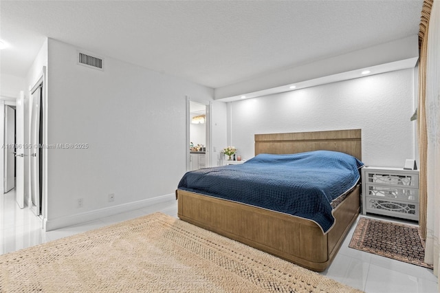 301 NE 14th Ave Unit 207, Hallandale Beach, FL 33009 - tiled bedroom with recessed lighting