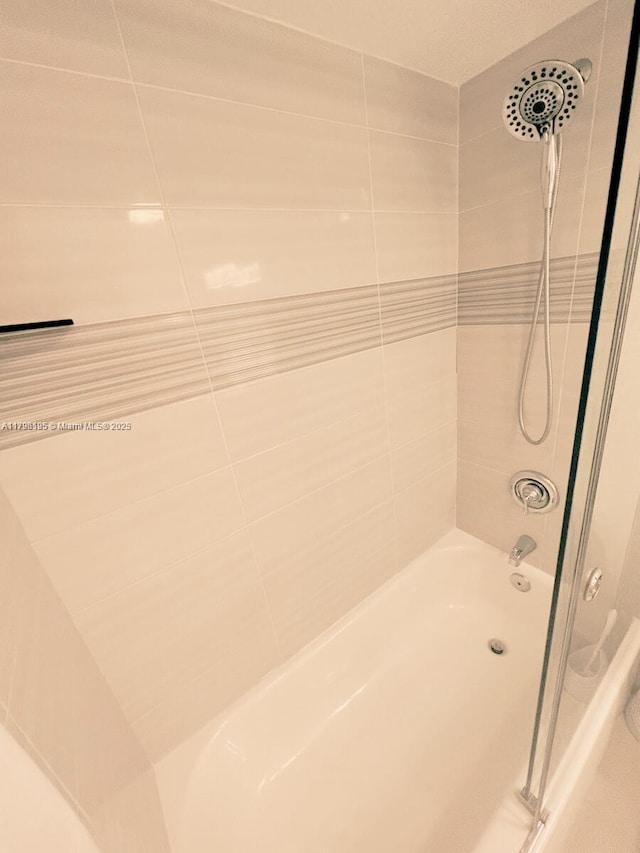 full bathroom with shower / bathtub combination