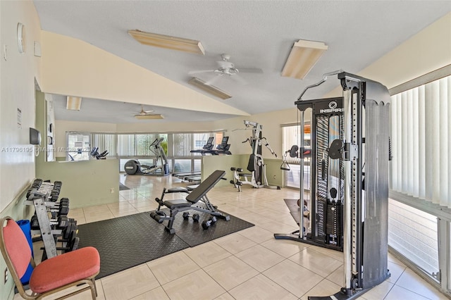 301 NE 14th Ave Unit 207, Hallandale Beach, FL 33009 - gym with vaulted ceiling, healthy amount of natural light, ceiling fan, tile patterned flooring, and a textured ceiling