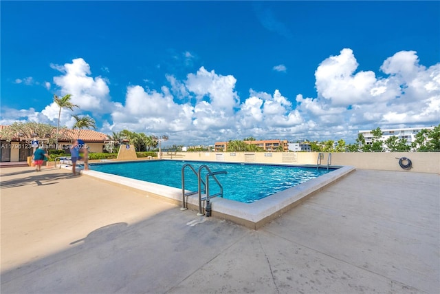 pool with a patio area