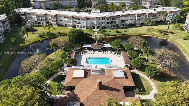 drone / aerial view with a water view