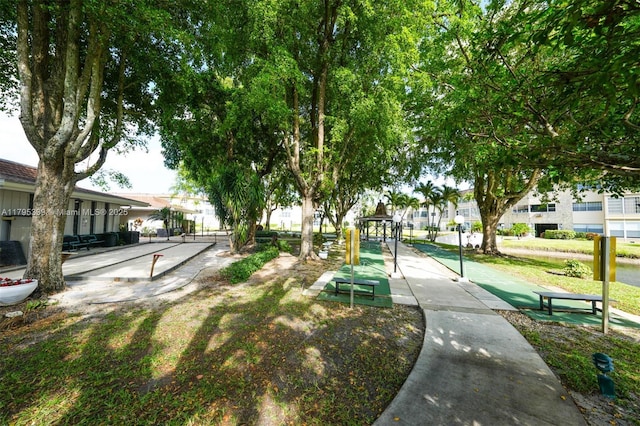 view of home's community with a residential view and shuffleboard