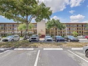 view of uncovered parking lot