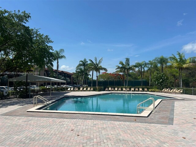 850 SW 133rd Ter Unit 312B, Pembroke Pines, FL 33027 - community pool with a patio area