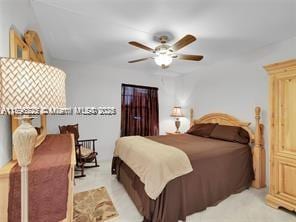bedroom featuring ceiling fan