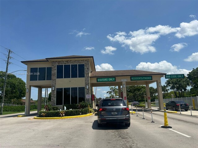 850 SW 133rd Ter Unit 312B, Pembroke Pines, FL 33027 - view of commercial location featuring uncovered parking